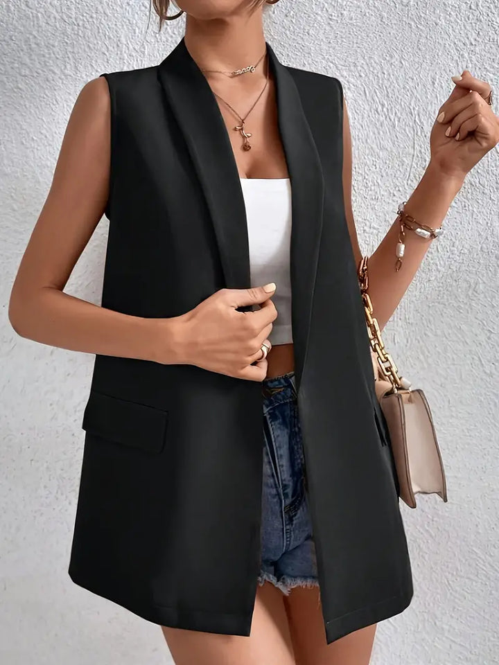 Stylish women's black sleeveless blazer vest. Perfect professional attire for the office, elegant and loose-fitting.