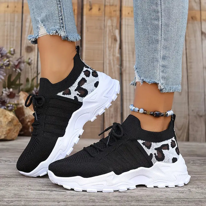 Lightweight women's animal print sneakers with breathable mesh, perfect for style & comfort.