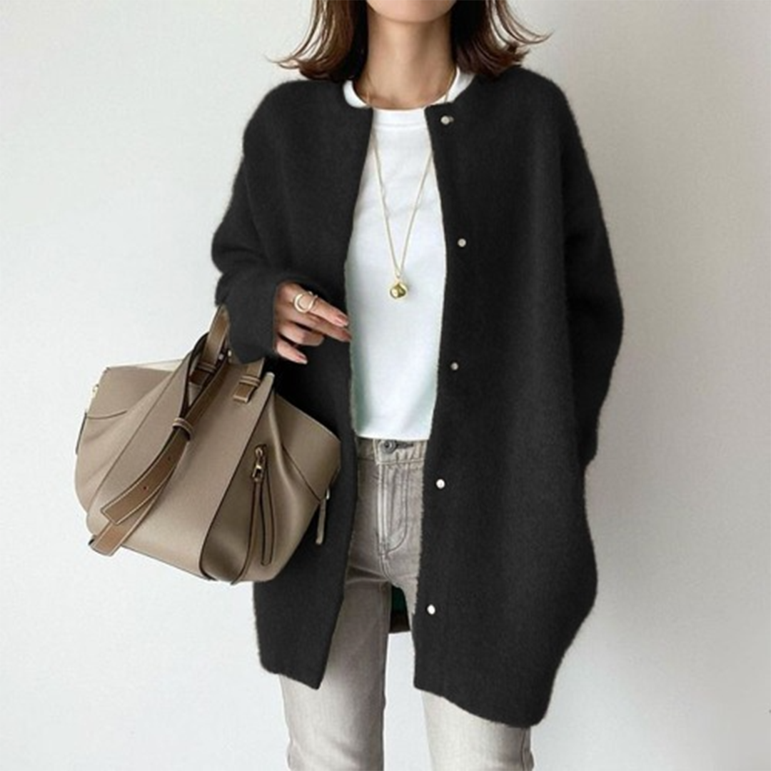 Timeless women's minimalist longline button cardigan, perfect for elegant casual layering in autumn.