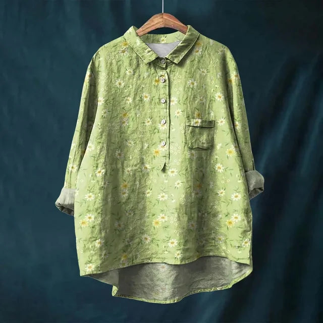 Women's elegant floral blouse with vintage print, puff sleeves, V-neck. Versatile for casual chic.
