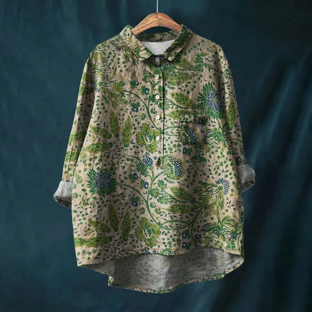 Plus size women's vintage floral blouse, elegant V-neck & puff sleeves, perfect for spring fashion.