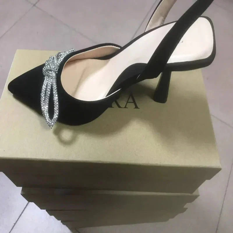 Pretty pink bow pointed high heel sandals, elegant slip-on footwear for women's summer fashion.