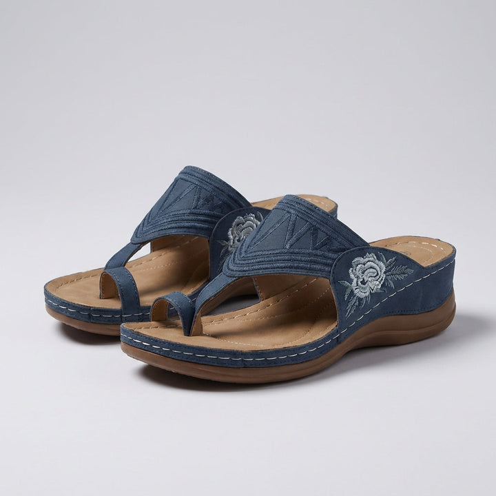 Orthopedic T-strap wedge sandals for women, designed for comfort and supportive everyday wear.