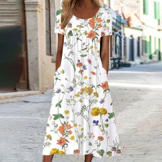 Breezy women's floral midi dress, elegant & comfortable for summer wear, day outings, or vacation.
