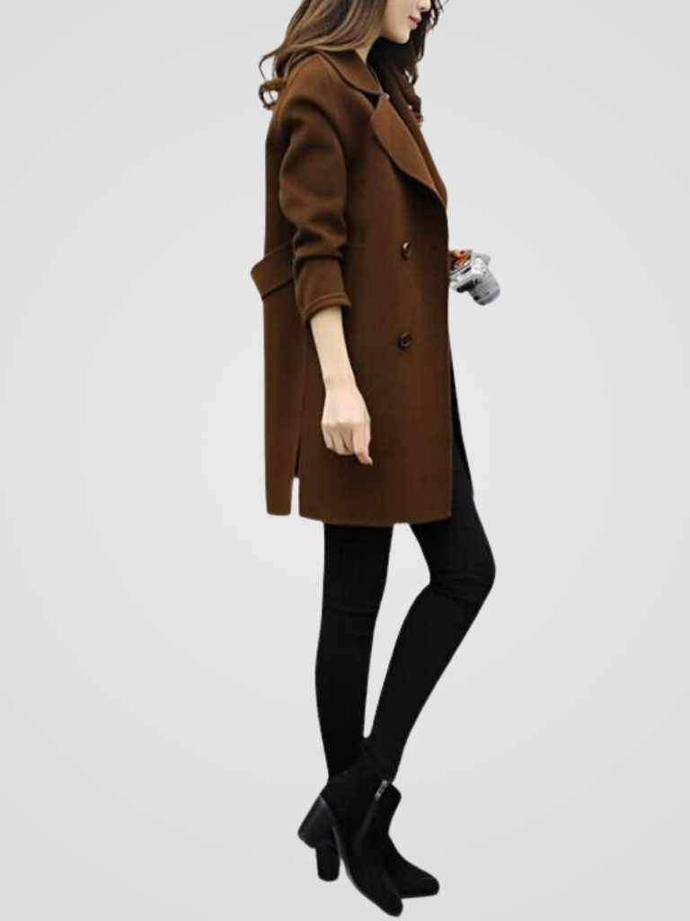 Elegant double-breasted women's longline coat, a sophisticated classic style for winter outerwear.