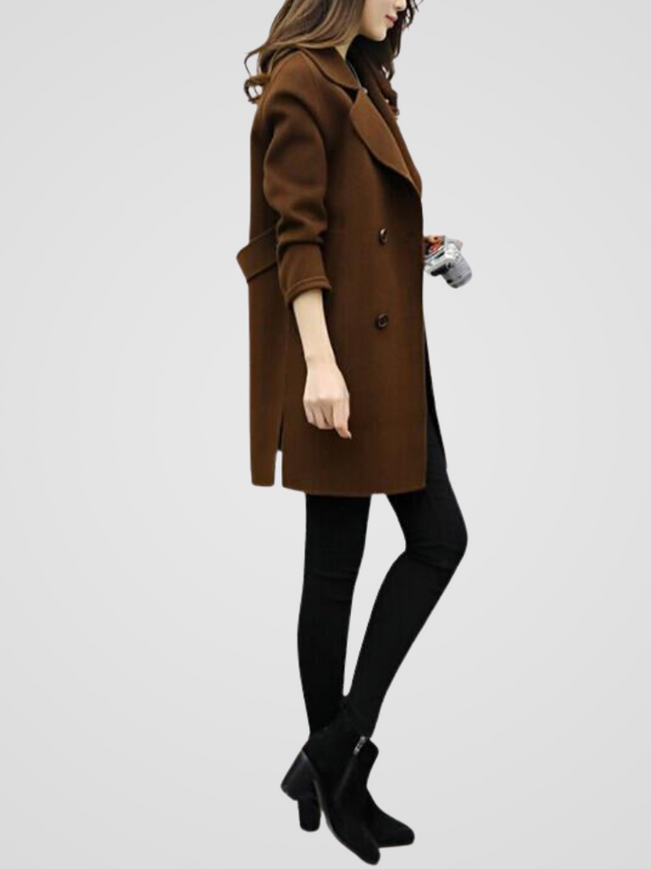 Elegant double-breasted women's longline coat, a sophisticated classic style for winter outerwear.
