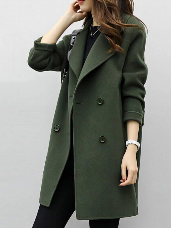 Sophisticated women's double-breasted longline coat, perfect for elegant workwear & classic fall fashion.