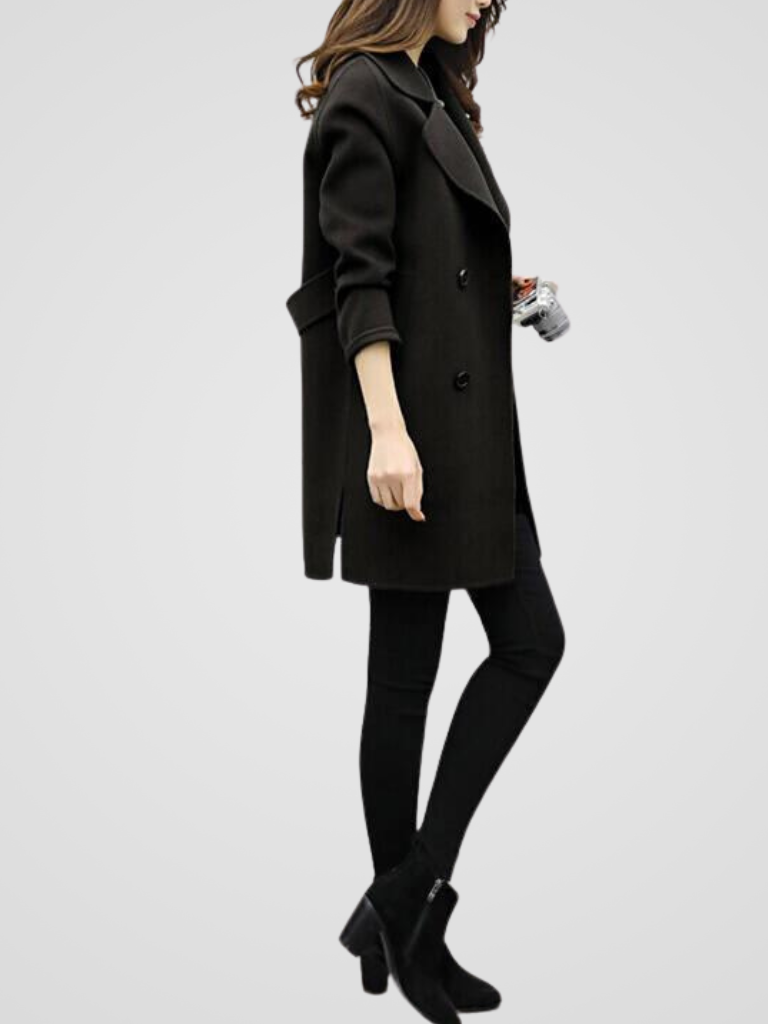 Elegant women's double-breasted longline trench coat, offering a sophisticated & classic style.