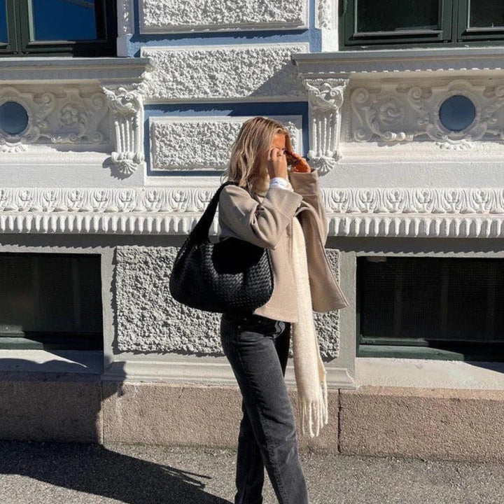 Elegant vegan leather woven shoulder bag for women, slouchy design, perfect handbag.