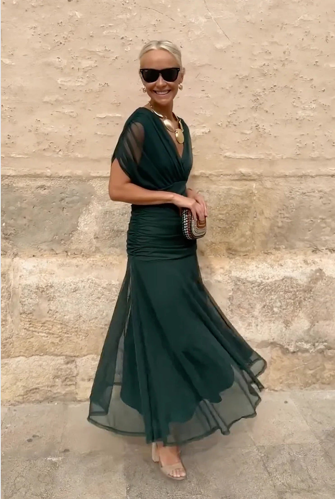 Formal V-neck wrap maxi dress for women, featuring elegant sheer sleeves. Great for evening wear.