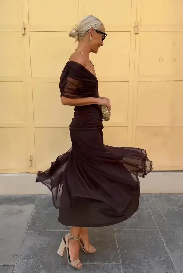 Women's elegant V-neck wrap maxi dress, long with beautiful sheer sleeves, ideal for occasions.