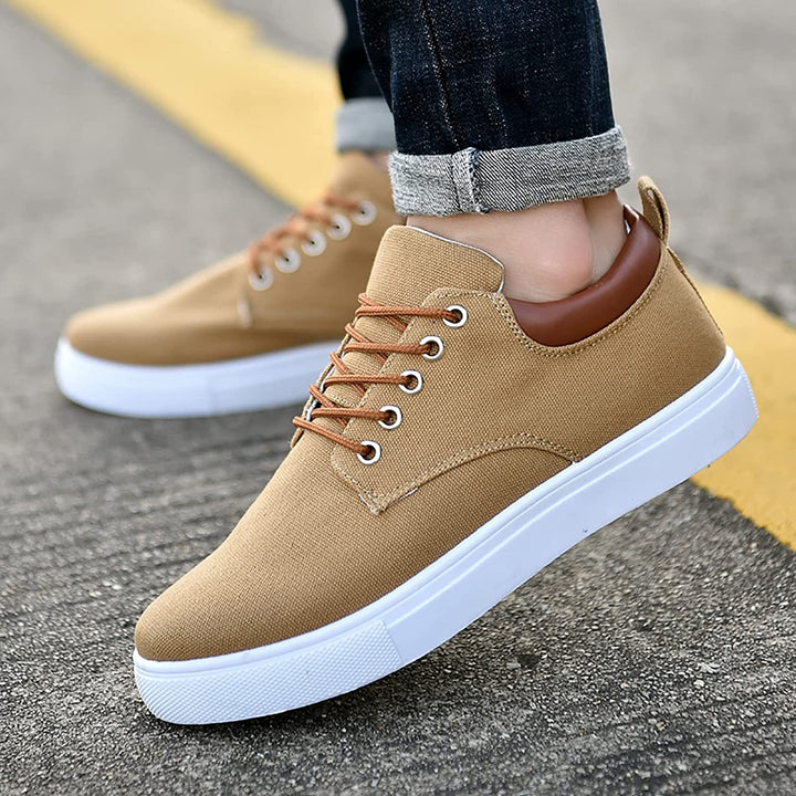 Platform sole men's sneakers, low-top lace-up style, offering cushioned support for casual wear.
