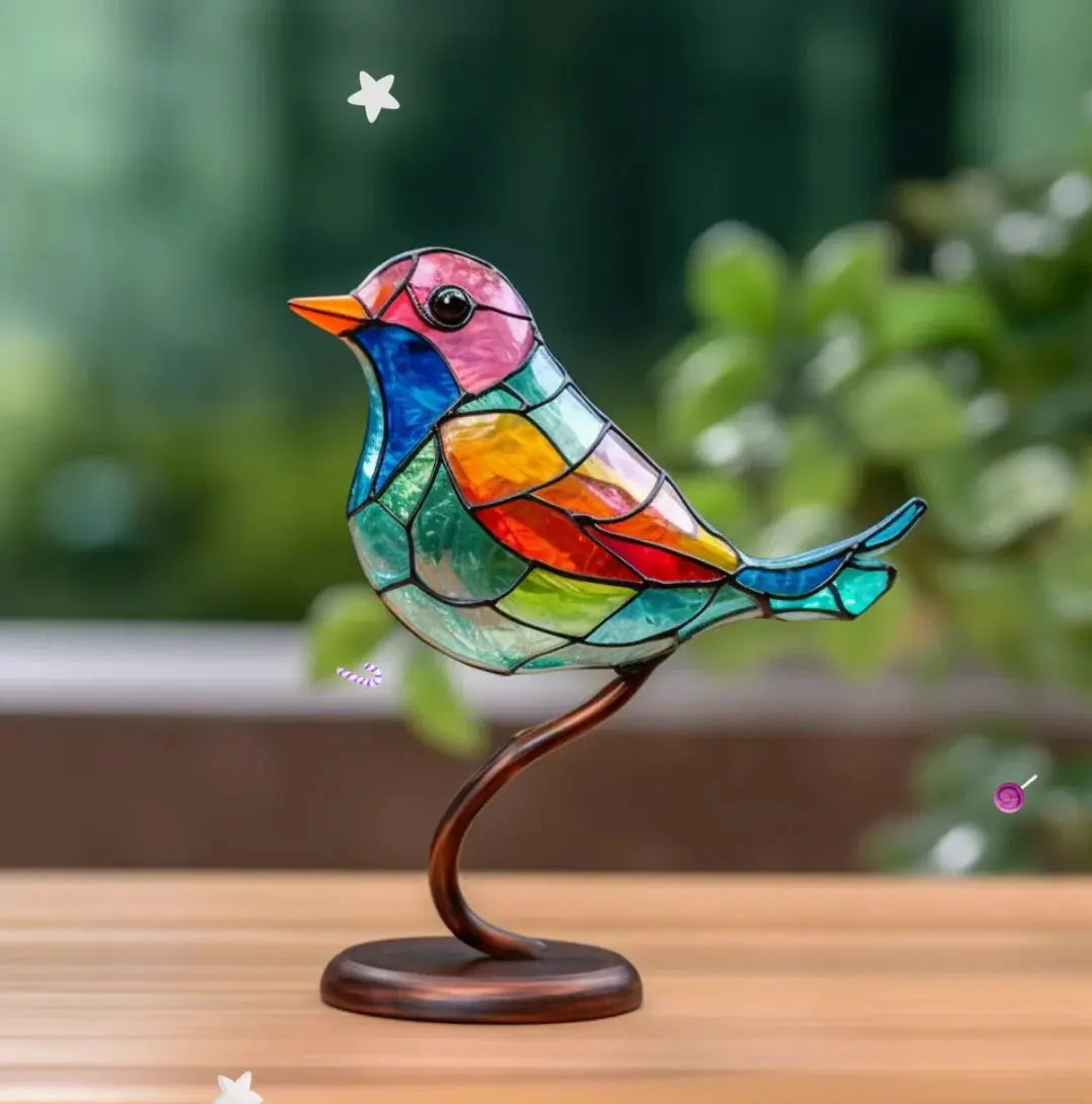 Reflective stained glass bird window decor, a vibrant nature-inspired home accent. Adds colorful light to any interior.