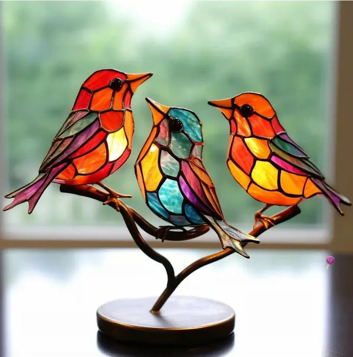 Decorative stained glass bird window accent, casting vibrant colors. A unique nature-inspired gift for interior design.