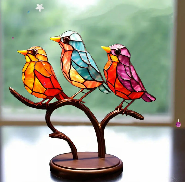 Beautiful stained glass bird suncatcher creating colorful light reflections. Ideal art glass window decoration for home.