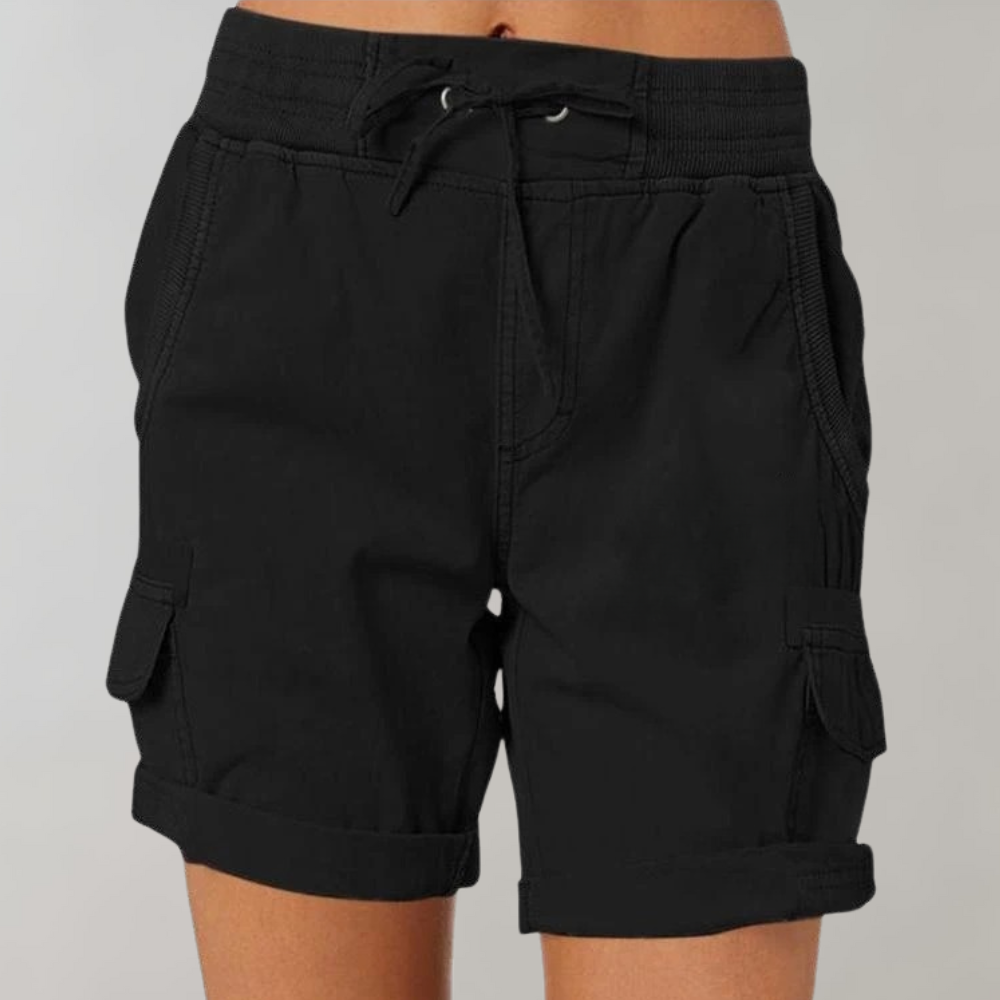 Fashionable women's high waist cargo shorts styled for a chic summer look, offering both comfort and modern style.