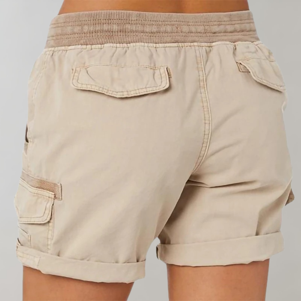Stylish women's high waist cargo shorts in a modern casual outfit, perfect for summer fashion and everyday wear.