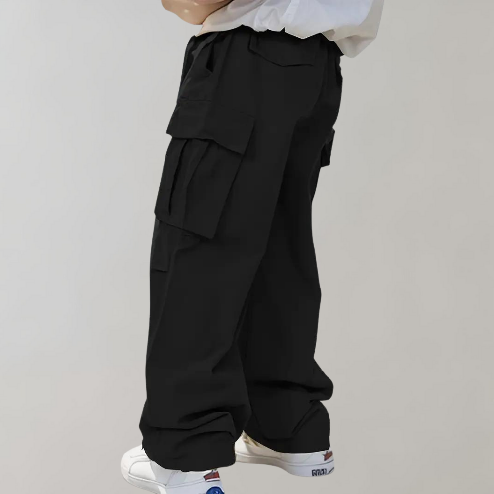 Back view: Comfortable men's loose fit cargo pants. Everyday versatile bottoms.