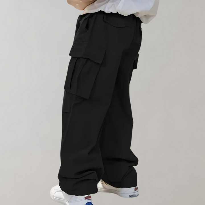 Back view: Comfortable men's loose fit cargo pants. Everyday versatile bottoms.