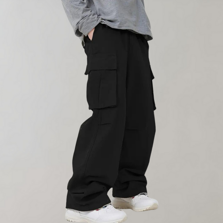 Men's oversized cargo pants for ultimate comfort & casual style. Straight leg, loose fit design.