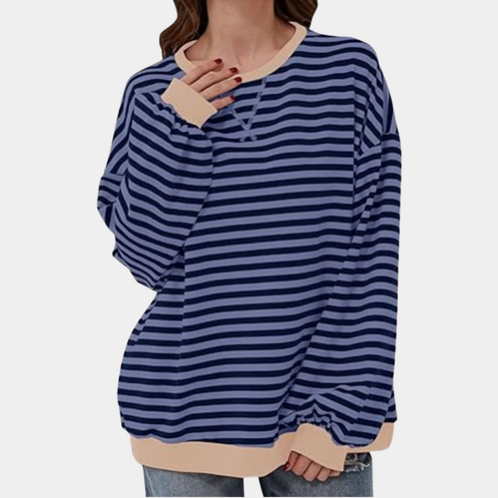 Comfortable women's oversized striped long sleeve t-shirt. Versatile casual everyday top for relaxed style.