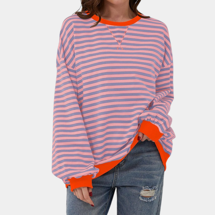 Stylish women's oversized long sleeve striped top, ideal for casual fall & spring outfits. Comfortable relaxed fit.