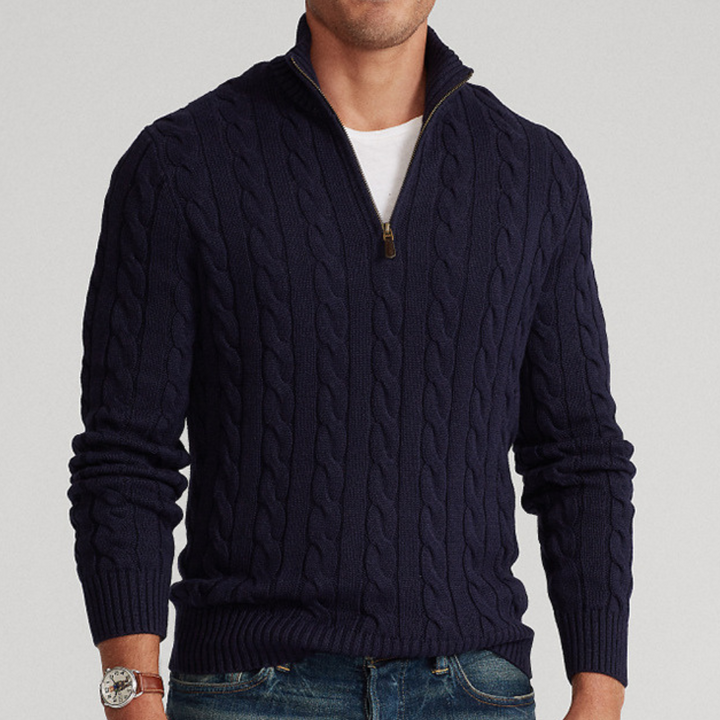 Model wearing a comfortable men's long-sleeve quarter-zip cable knit sweater, a versatile winter fashion choice.