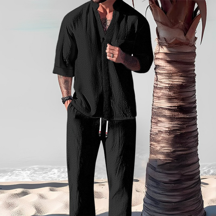Men's relaxed-fit two-piece shirt & trousers set in breathable fabric, perfect for summer casual wear.