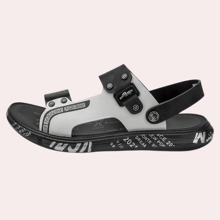 Stylish men's urban buckle sandals with cushioned support for everyday comfort. Versatile summer and casual footwear.