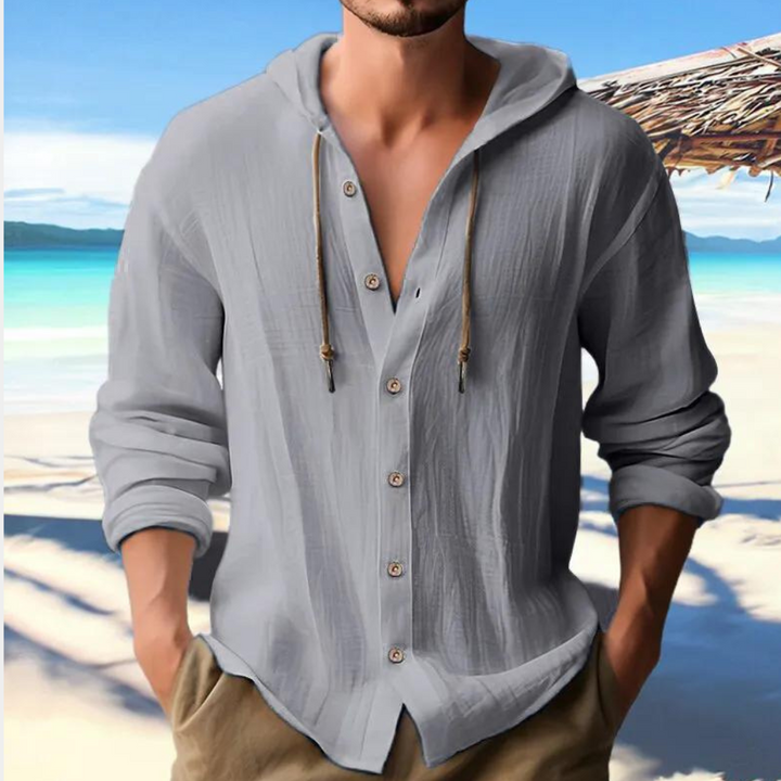 Comfortable men's relaxed fit hooded long sleeve shirt. Versatile casual top for spring/fall layering.