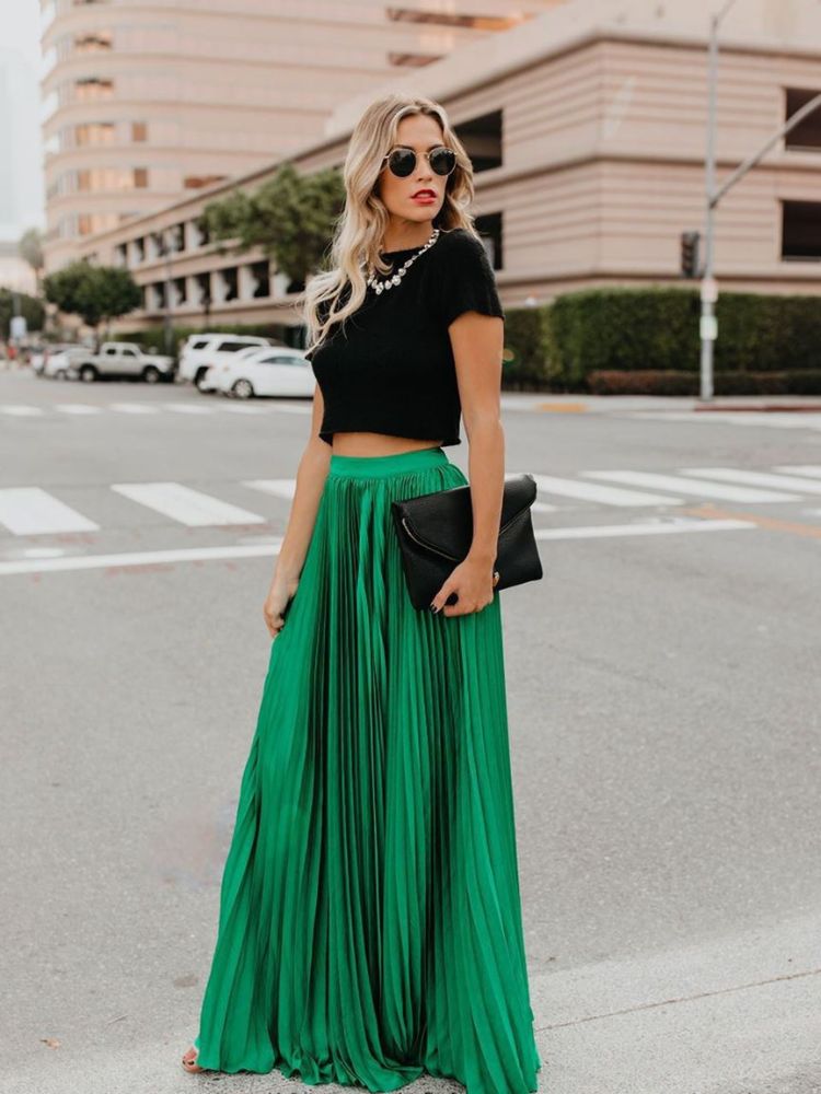 Chic women's pleated midi skirt, versatile for spring, summer, and all-season elegant or casual fashion.