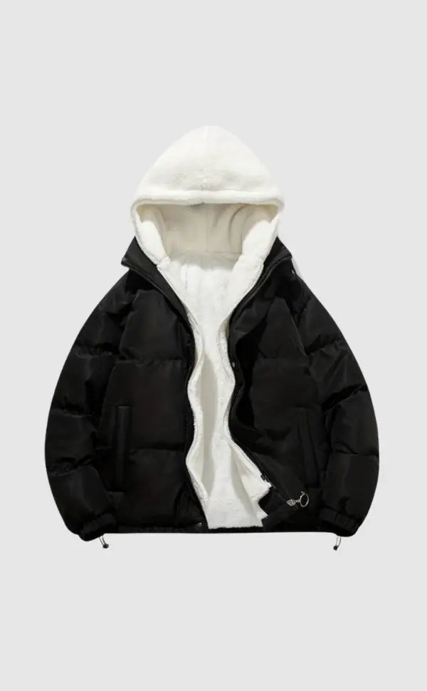 Women's luxury black puffer jacket with plush hood, perfect for cold weather & chic winter style.