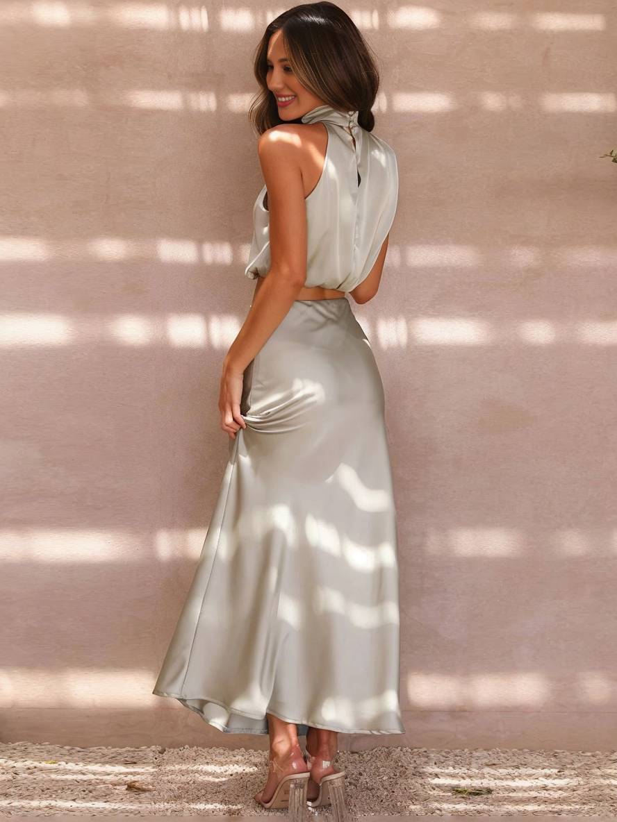 Beautiful two-piece halter wedding guest dress. Perfect for stylish spring/summer events.
