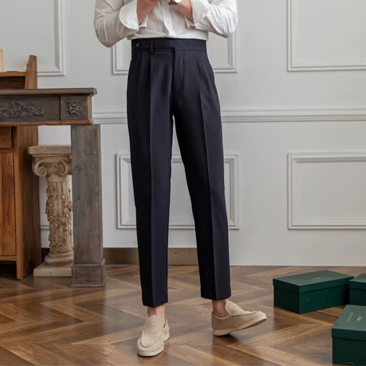 Men's camel pleated chino trousers, a stylish and elegant menswear staple.