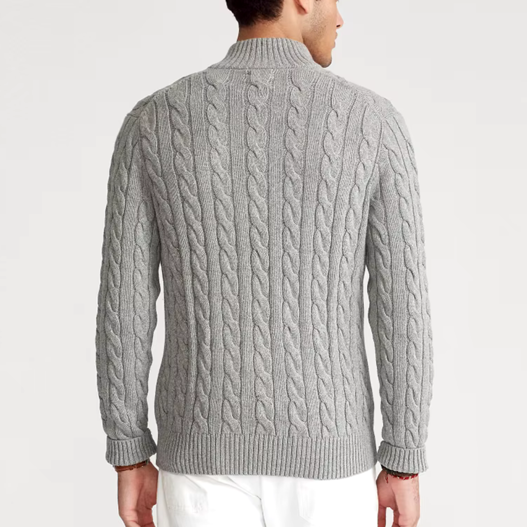 Textured men's cable knit quarter-zip sweater in a versatile design, ideal for casual and sophisticated looks.