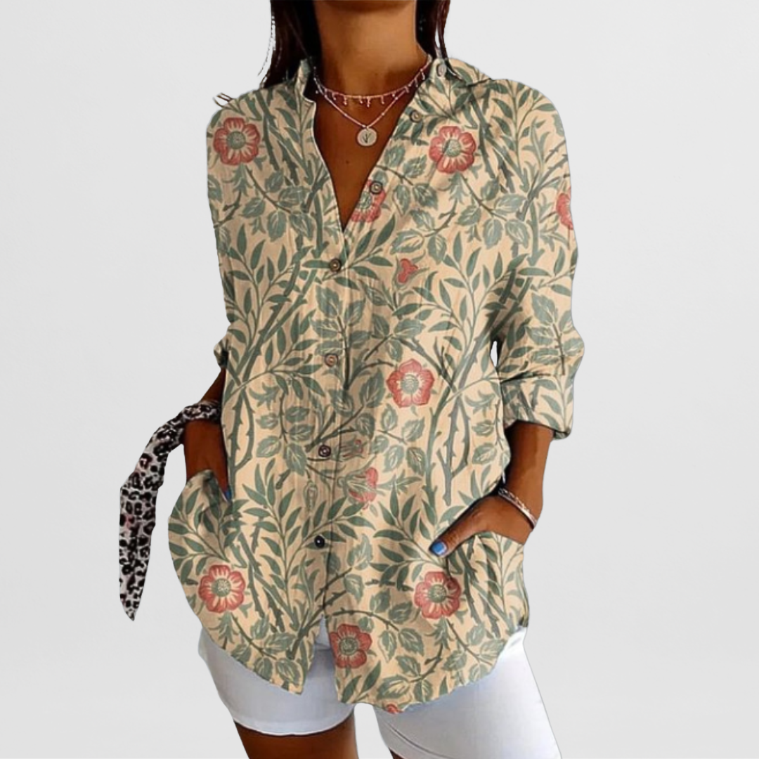Stylish women's tropical floral top with a relaxed loose fit. Perfect vibrant long sleeve blouse for spring/summer.