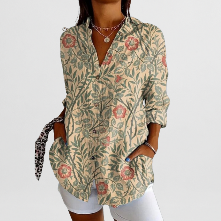 Stylish women's tropical floral top with a relaxed loose fit. Perfect vibrant long sleeve blouse for spring/summer.