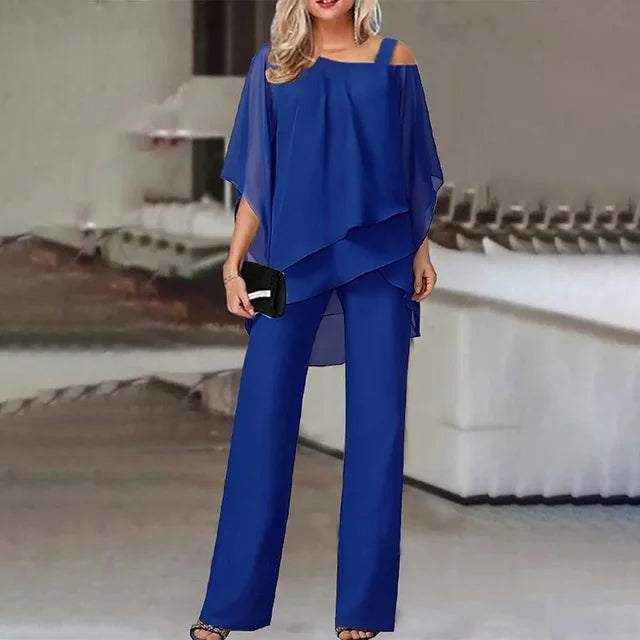 Stylish women's two-piece jumpsuit with off-shoulder top & wide-leg pants in chiffon. Casual chic or formal.