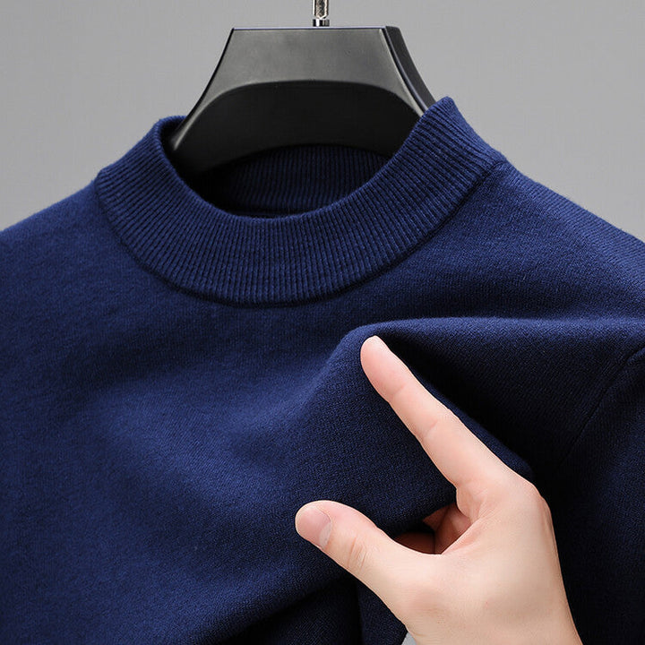 High-quality men's long sleeve pullover sweater. Tailored fit with an elegant hem, perfect for sophisticated style.