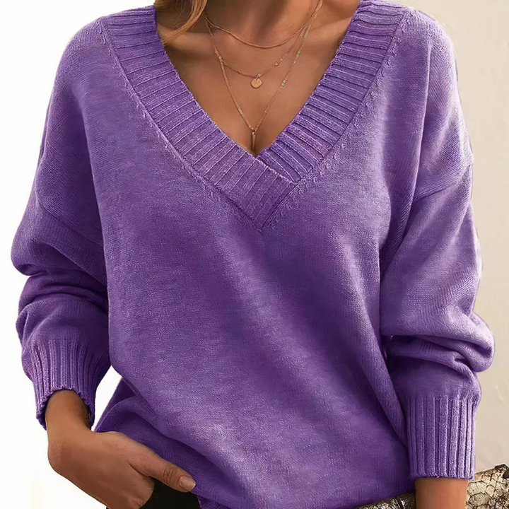 Cozy & elegant women's V-neck pullover sweater. Chic long sleeve knit top, perfect for comfortable fall and winter.