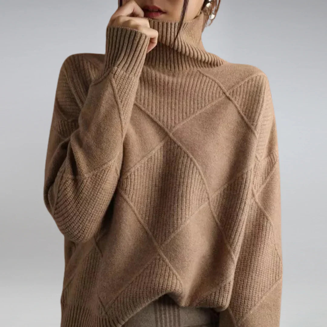 Cozy women's turtleneck sweater with long sleeves, offering elegant comfort for winter fashion.