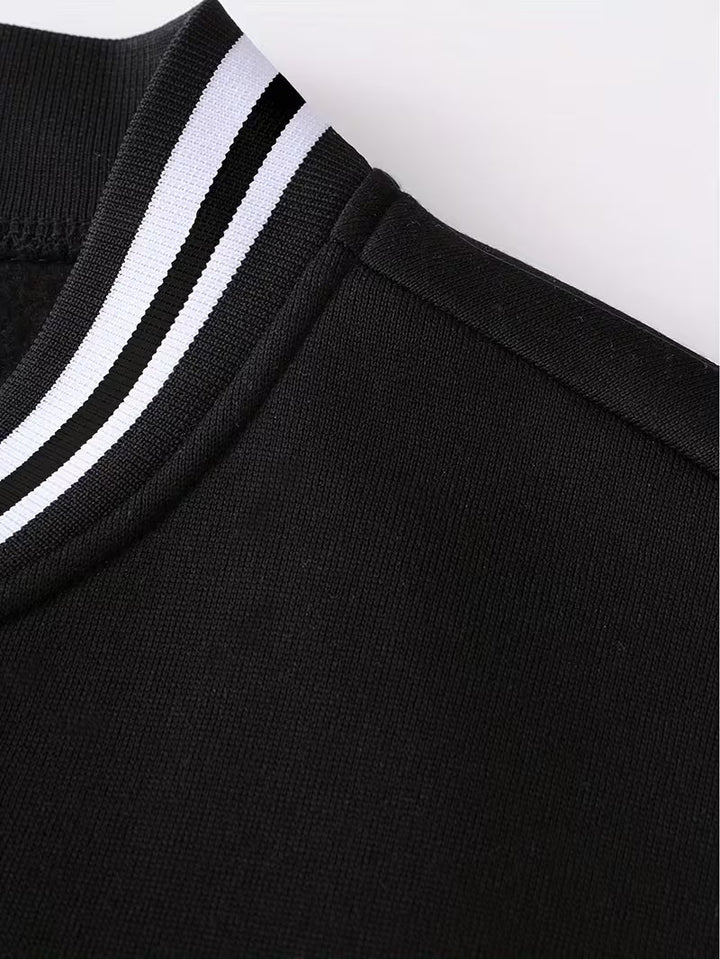 Stylish men's color block baseball jacket. Zip-up lightweight outerwear for a comfortable, modern autumn look.