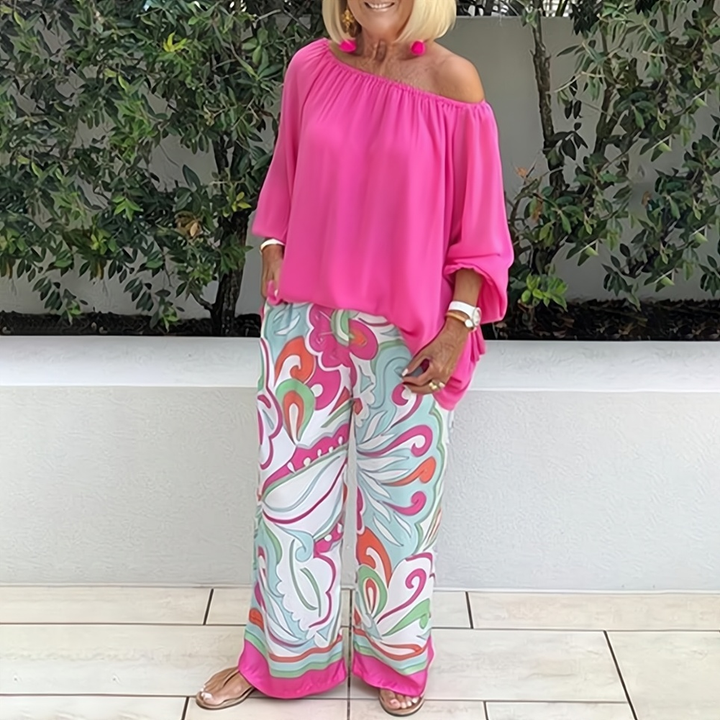 Elegant women's wide-leg top and pants set, perfect for chic summer fashion. Relaxed fit two-piece outfit.
