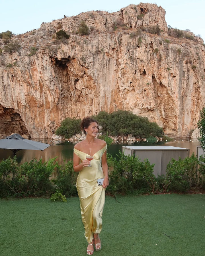 Chic yellow backless maxi dress. Elegant women's long gown, perfect for glamorous evening or formal special occasions.