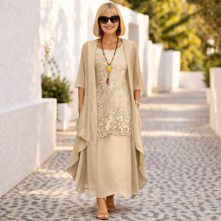 Women's versatile round neck dress, elegant knee-length design with a flattering smocked waist for summer.