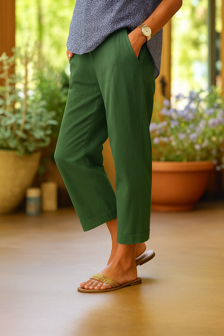 Chic women's lightweight trousers featuring a relaxed fit & elastic waist. Perfect comfortable bottoms for summer casual wear.