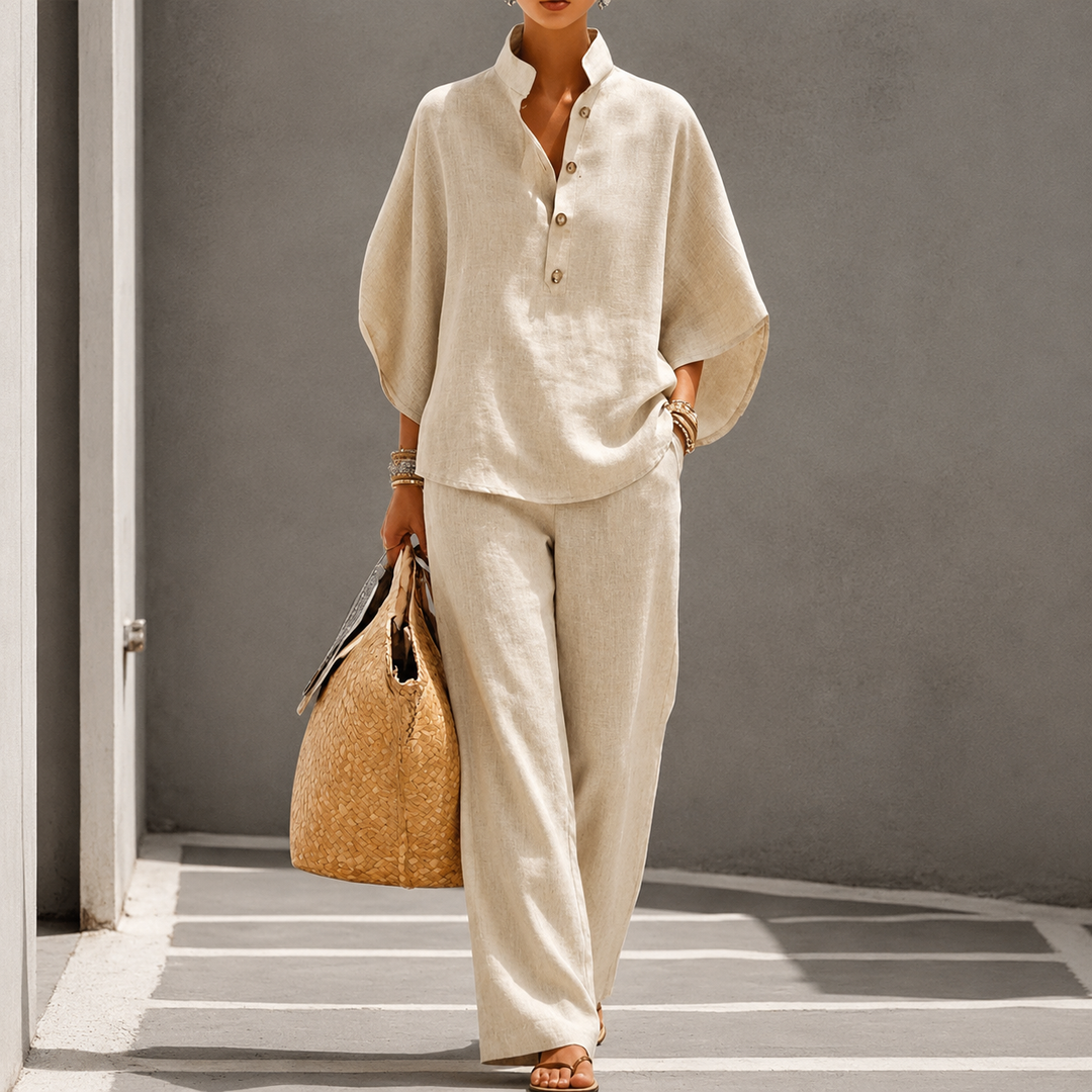 Stylish women's matching top and wide-leg trousers two-piece set, combining elegance with casual comfort.