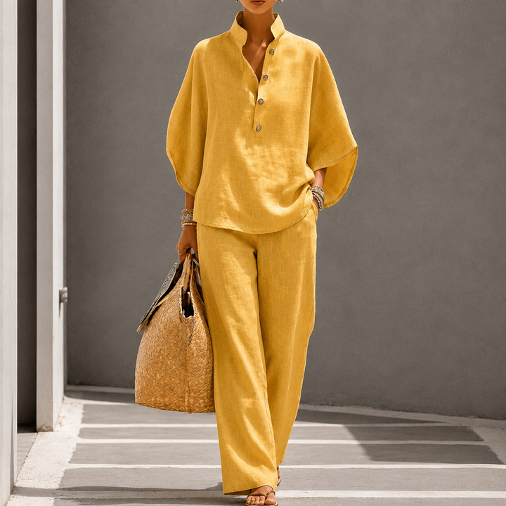 Lightweight women's two-piece wide-leg trouser set, an elegant and comfortable choice for summer travel outfits.