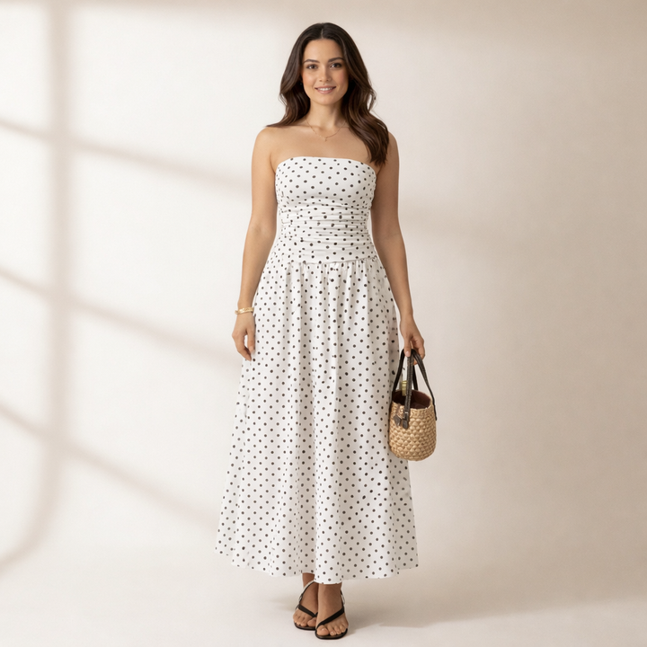 Women's elegant strapless polka dot maxi dress, perfect for summer parties & vacations. Chic timeless fashion.