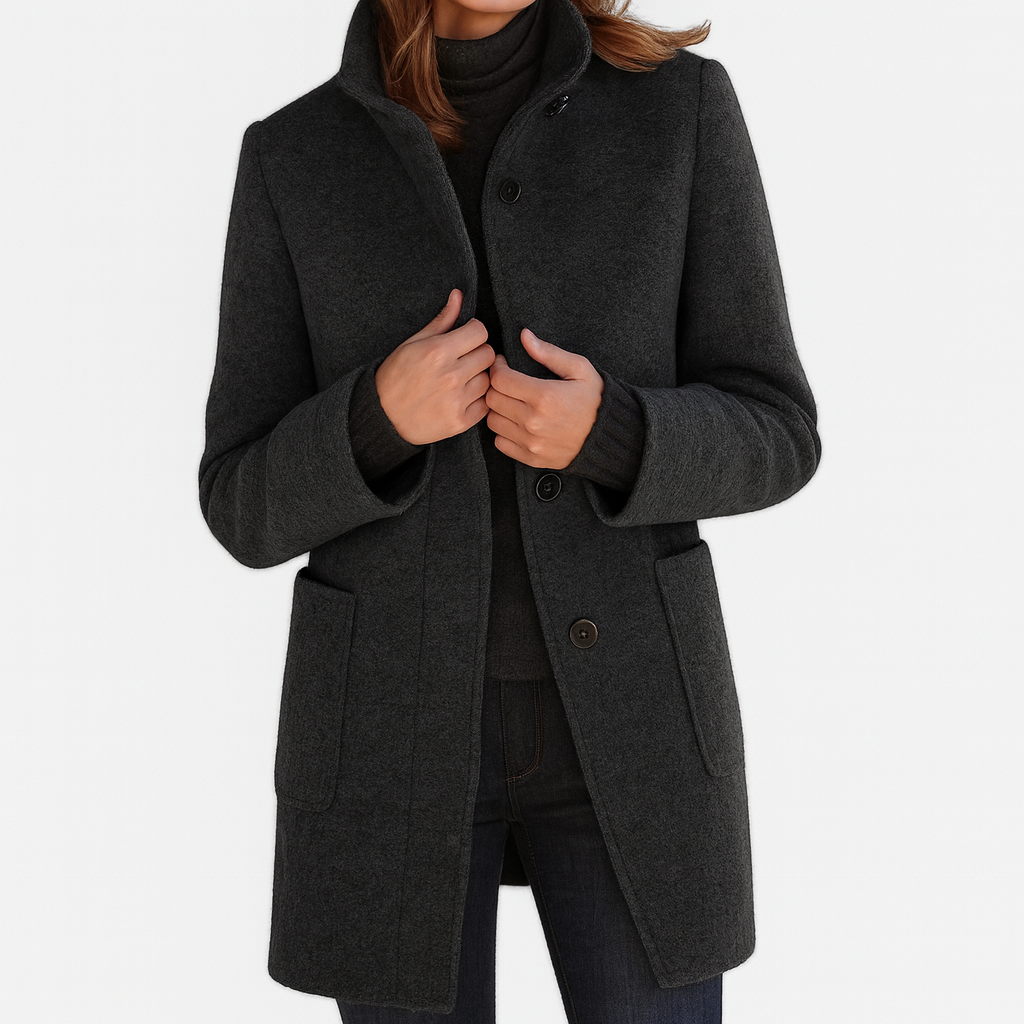 Back view of an elegant women's straight cut mid-length coat, minimalist outerwear for versatile winter style.